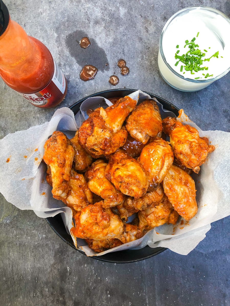 Medium pizza with 10 pieces buffalo wings and soda pickup special